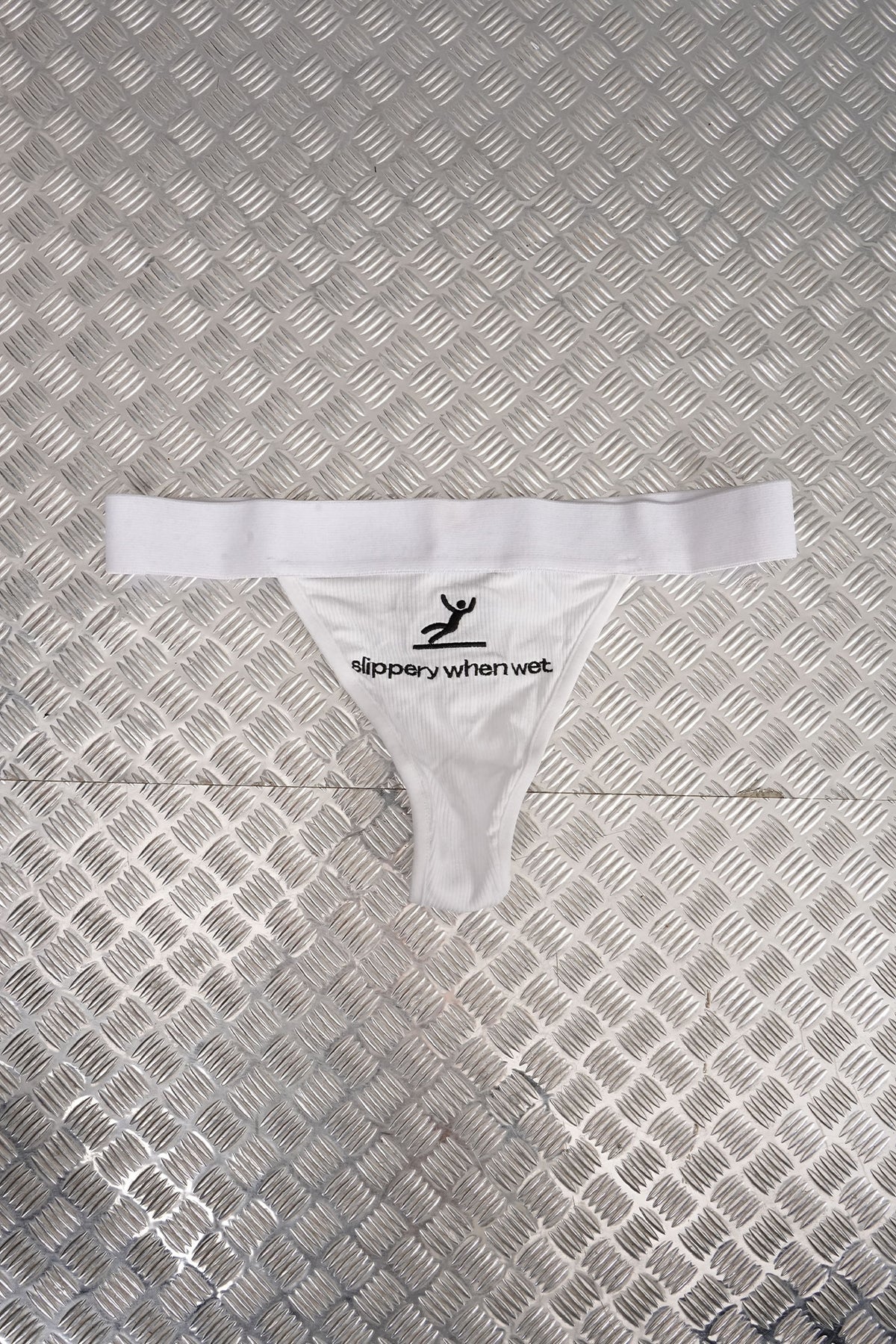 SLIPPERY RIP THONG